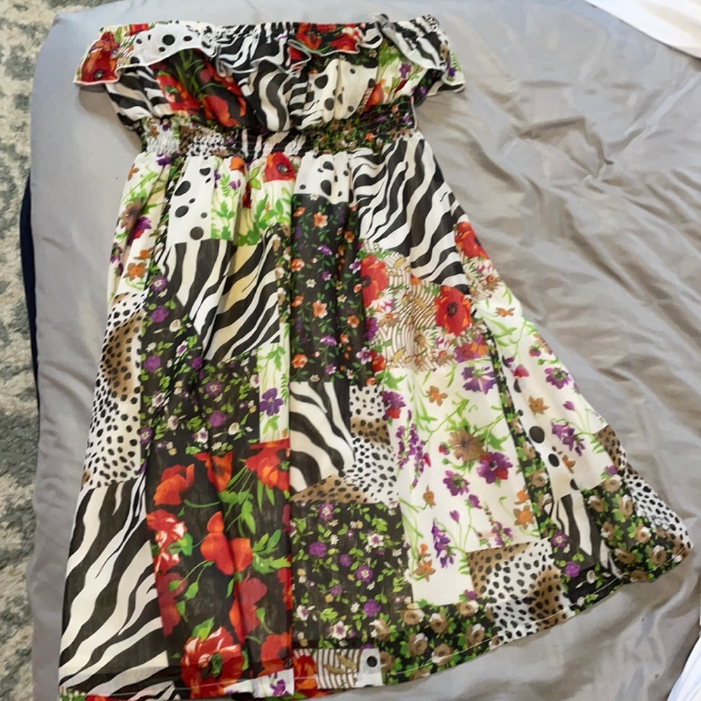 This dress has multiple designs on it.